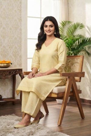 Woman modeling a traditional Kerala Kasavu pure cotton kurta and palazzo set in ivory white with a shimmering golden zari border, ideal for Onam festival wear.